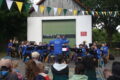 Foto, das Orchester, mit Dirigent, in Aktion.